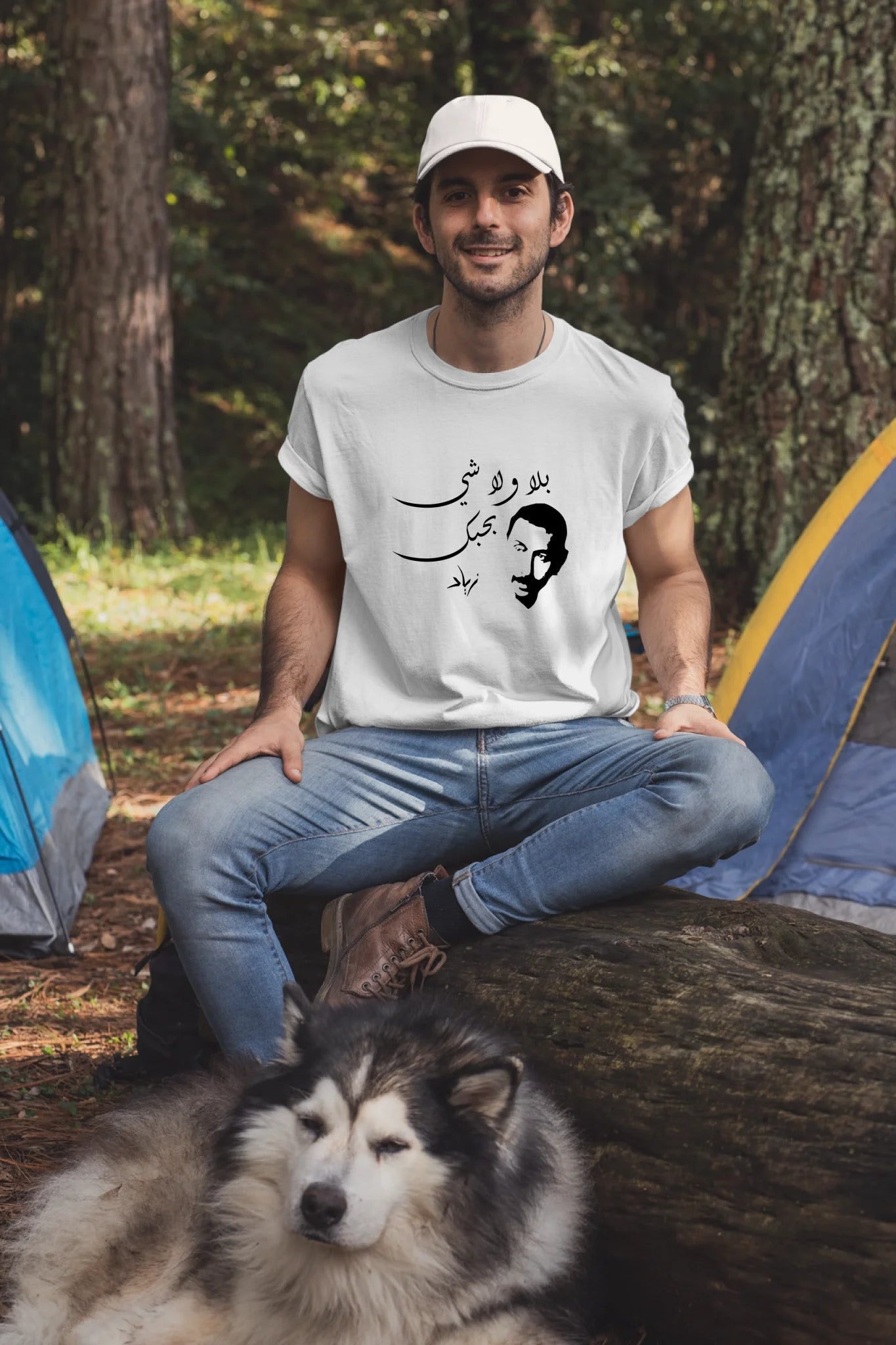 t-shirt-and-dad-hat-mockup-of-a-man-at-a-camping-site-with-his-dog-30475