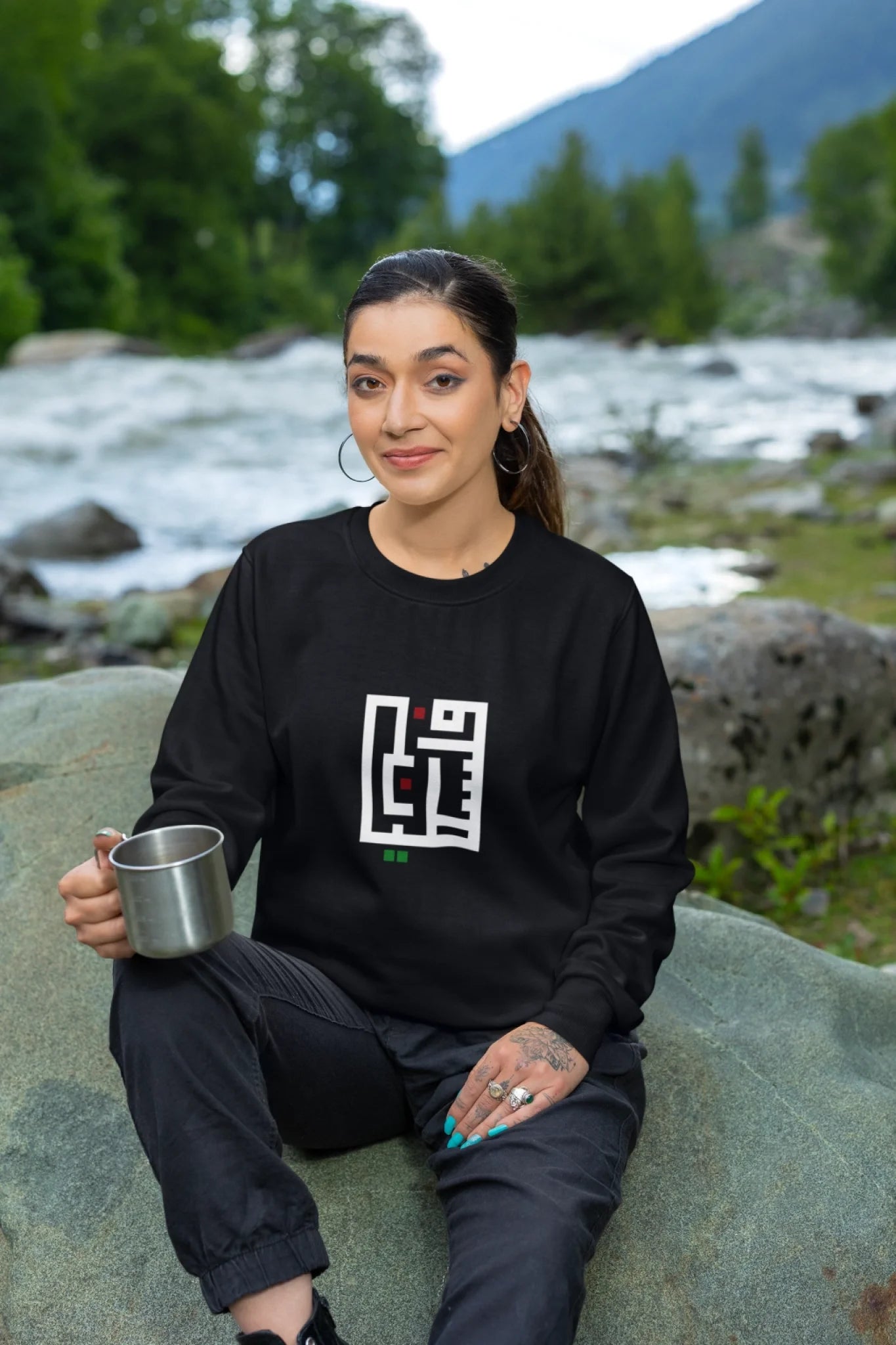 crewneck-sweatshirt-mockup-featuring-a-tattooed-woman-sitting-on-a-rock-m35583 (1)